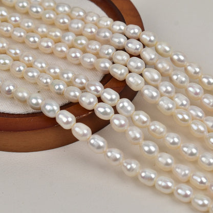 1053 Natural freshwater pearl macroporous rice beads 7-8mm white