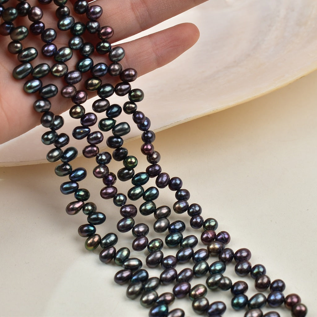1047 Natural Freshwater Pearl 4-5mm Peacock Black Rice Bead