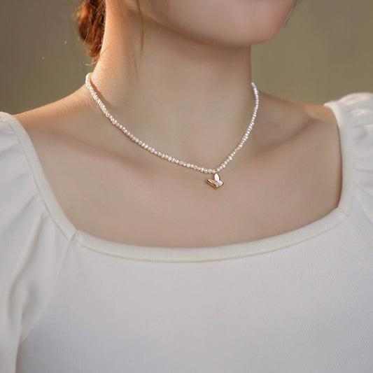 Millet bead necklace women's natural freshwater small rice grain pearl neck chain temperament advanced butterfly collarbone chain