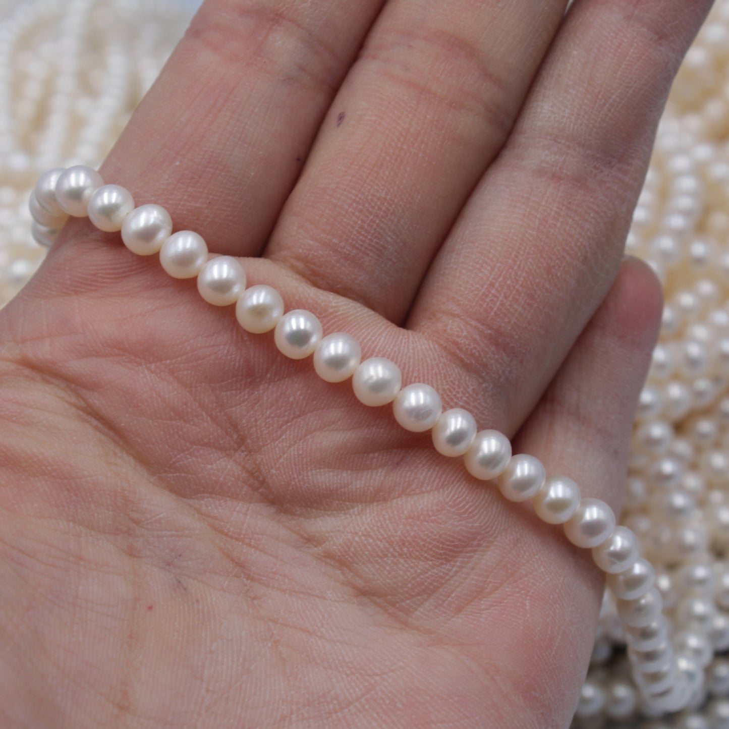 1132 new 5-5.5 mm strong light nearly round natural freshwater pearl DIY material