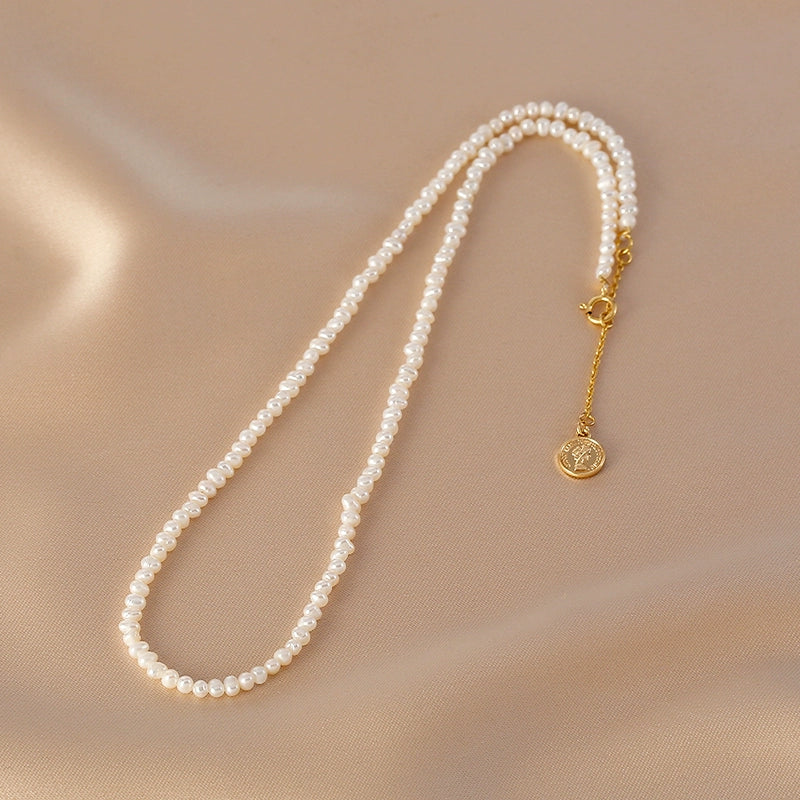 Natural pearl necklace, simple and exquisite irregular millet beads, tag necklace.