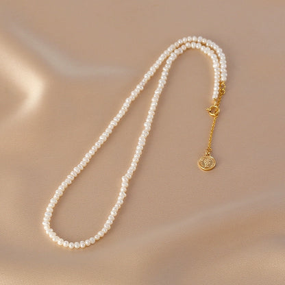 Natural pearl necklace, simple and exquisite irregular millet beads, tag necklace.