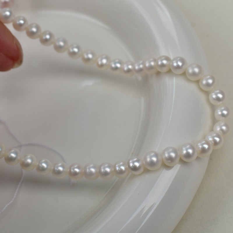 1178 5-6Mm nearly round pink purple pearl work in progress