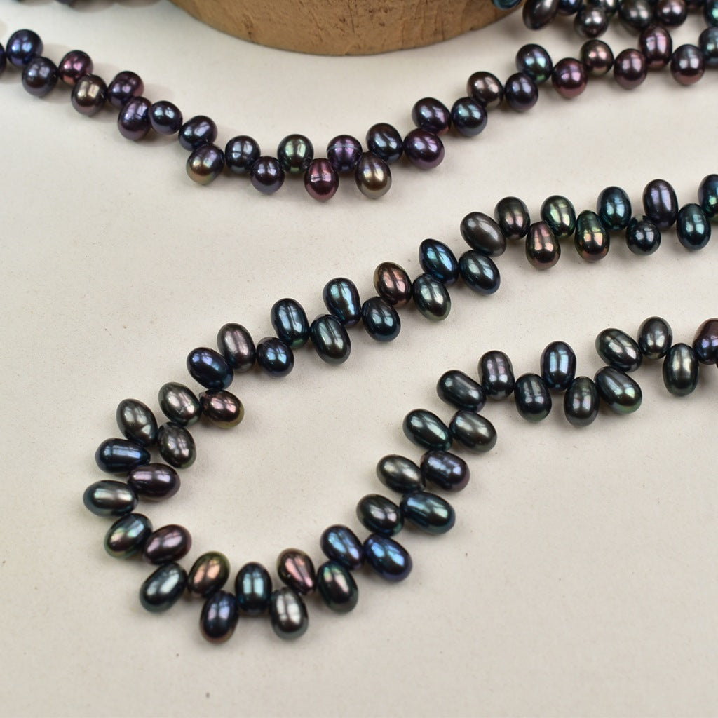 1047 Natural Freshwater Pearl 4-5mm Peacock Black Rice Bead
